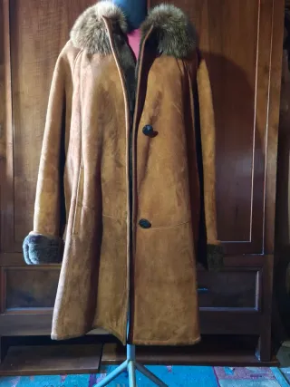 Cappotto in shearling con pelliccia