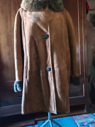 Cappotto in shearling con pelliccia