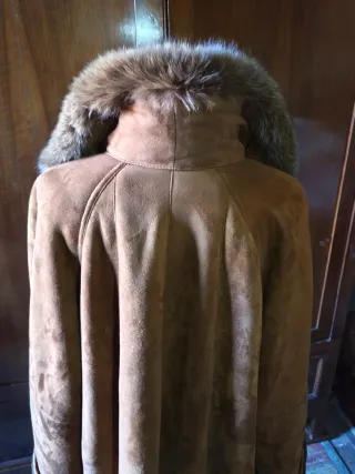 Cappotto in shearling con pelliccia