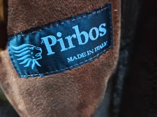 Cappotto in shearling con pelliccia