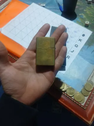 Mechero Zippo Bronce Jinete seminuevo su caja
