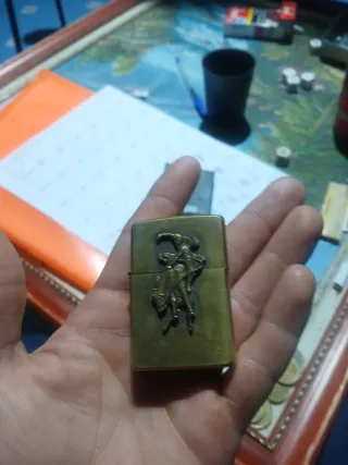 Mechero Zippo Bronce Jinete seminuevo su caja