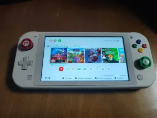 Nintendo switch lite blanca con "juegos"