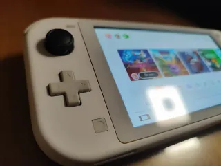 Nintendo switch lite blanca con "juegos"