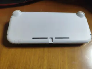 Nintendo switch lite blanca con "juegos"