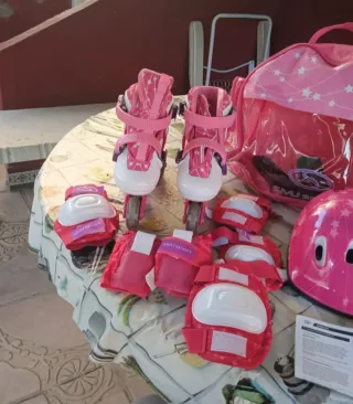 Patines rosas niña con protecciones y casco