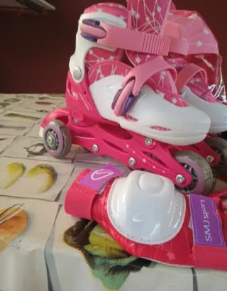 Patines rosas niña con protecciones y casco