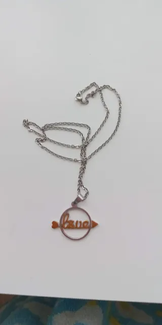 Cadena con colgante señora en plata y dorado