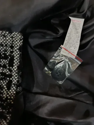 Abrigo negro y gris kiabi