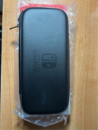 Nintendo Switch+ funda oficial + juego