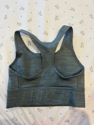 Top deportivo Nike gris jaspeado talla xs