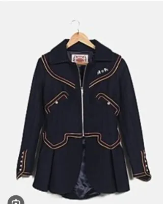 Abrigo paño azul asimétrico