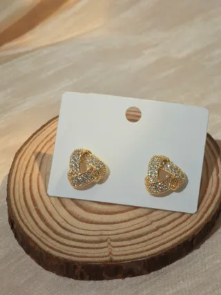 Orecchini nodo dorati con zirconi