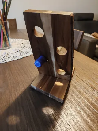 Porta bottiglie in legno grezzo