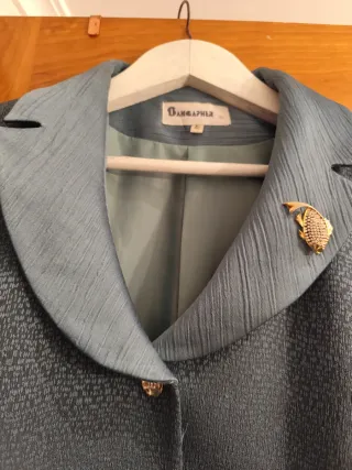 Traje de chaqueta azul verdoso