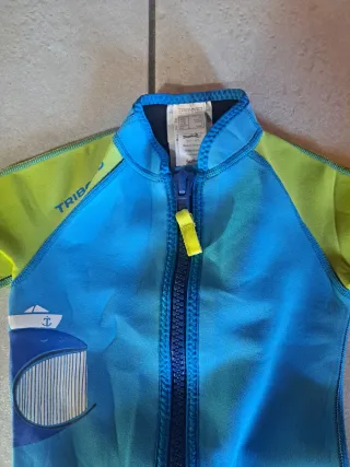 Muta bambino blu e verde con stampa balena