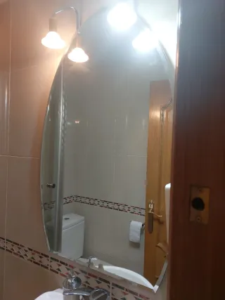 Specchio ovale da bagno con lampade