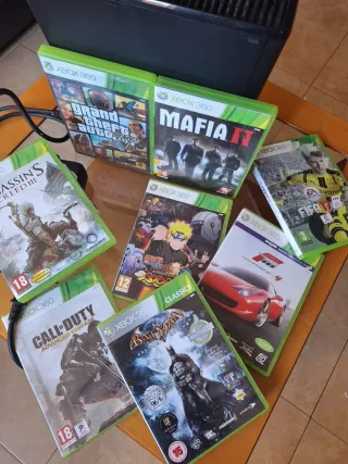 Xbox 360 con 8 juegos y 2 mandos