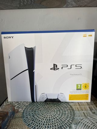 Caja PS5 Sony con manuales