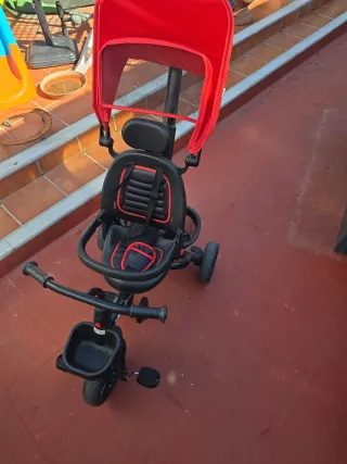 Triciclo infantil rojo y negro