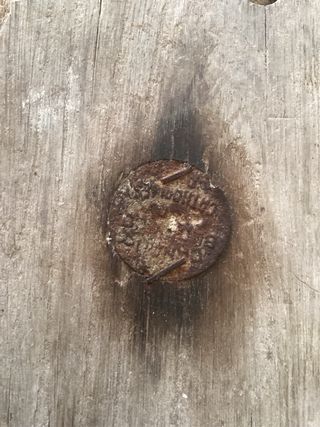 Carrucha antigua de madera y metal