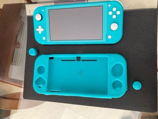 Nintendo Switch con funda, maletin y juegos