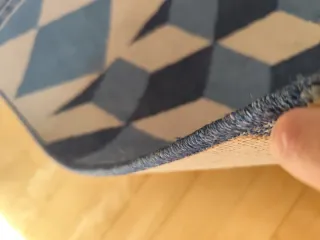 Alfombra diseño geométrico beige y azul