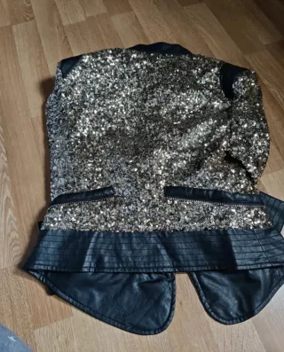 Chaqueta lentejuelas negra y dorada