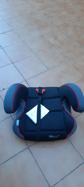 Asiento elevador niño coche