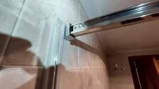 Mampara de ducha de cristal y metal