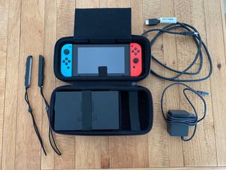 Nintendo Switch + Animal Crossing + funda oficial