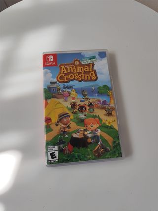 Nintendo Switch + Animal Crossing + funda oficial