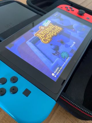Nintendo Switch + Animal Crossing + funda oficial