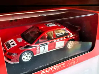 Mitsubishi Lancer Evo AUTOart slot nuevo en caja