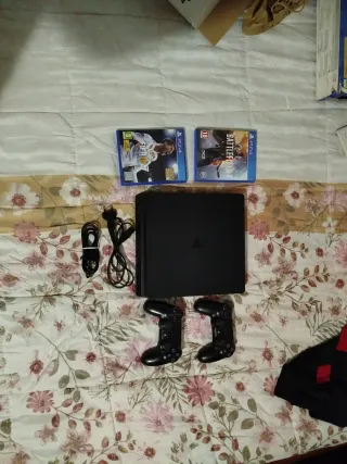 PS4 (PlayStation 4) Negra + Accesorios y juegos