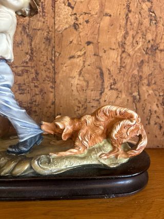 Figurita porcelana vintage niño con perro