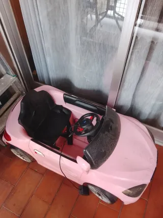 Coche eléctrico infantil a batería rosa