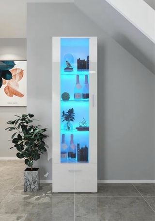 Mueble expositor blanco con puertas de cristal