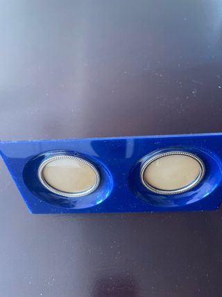 Portaforos para dos fotografías.