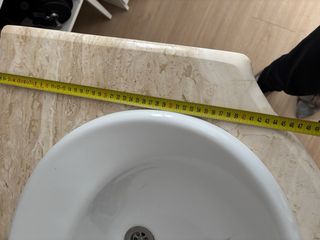 Mueble de baño con lavabo de mármol