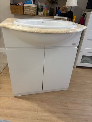 Mueble de baño con lavabo de mármol