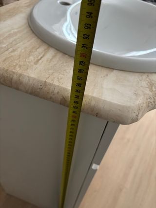 Mueble de baño con lavabo de mármol