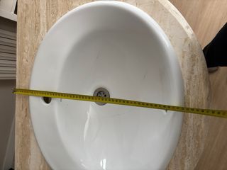 Mueble de baño con lavabo de mármol