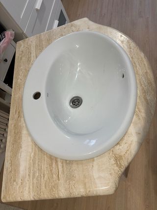 Mueble de baño con lavabo de mármol