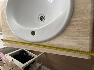 Mueble de baño con lavabo de mármol