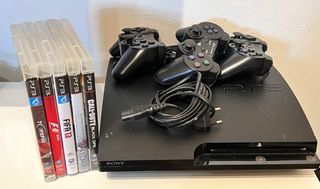 Consola PS3 Slim con 3 mandos y 5 juegos