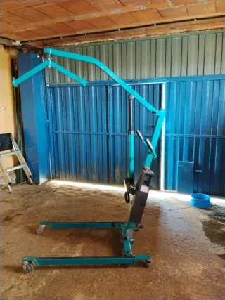 Grúa de personas enfermas con sus complementos