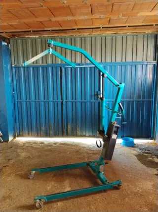 Grúa de personas enfermas con sus complementos