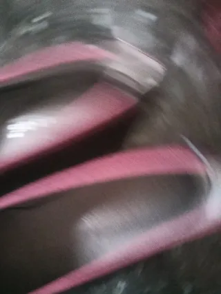 Zapatos de salón rosas con pompón