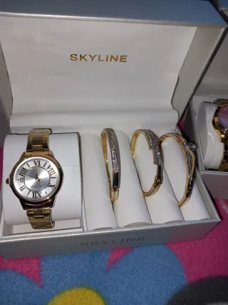Reloj Skyline Mujer Dorado y Blanco